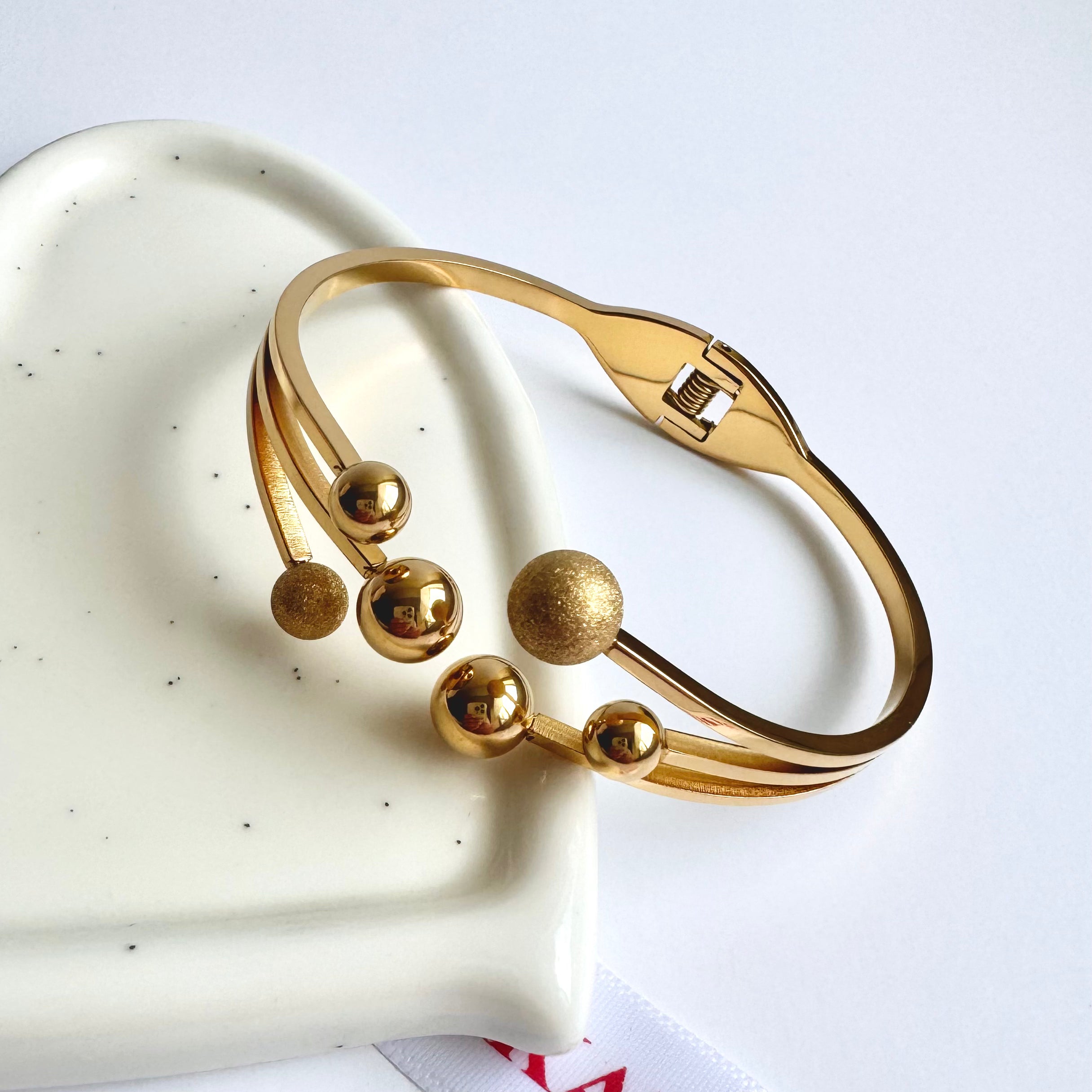 Selena – Modern Gold Bracelet with Textured Spheres 🌟
