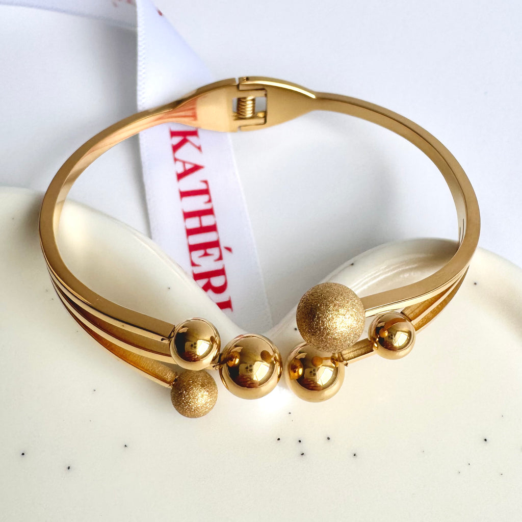 Selena – Modern Gold Bracelet with Textured Spheres 🌟
